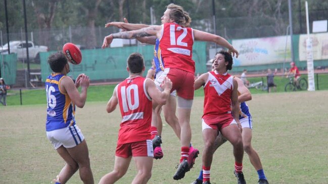 Lachlan Buckley (12) booted three in the weekend’s win alongside a boom Bloods recruit who kicked a bag. Picture: Dorey’s Footy Pixs