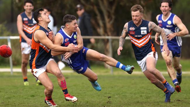 EDFL: Nikolas Dimeski of Coburg Districts under pressure from Burnside Heights’ Gabriel Cristiano. Picture: Hamish Blair