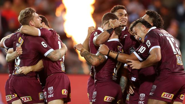 The Maroons celebrate State of Origin victory (Photo by Mark Kolbe/Getty Images).