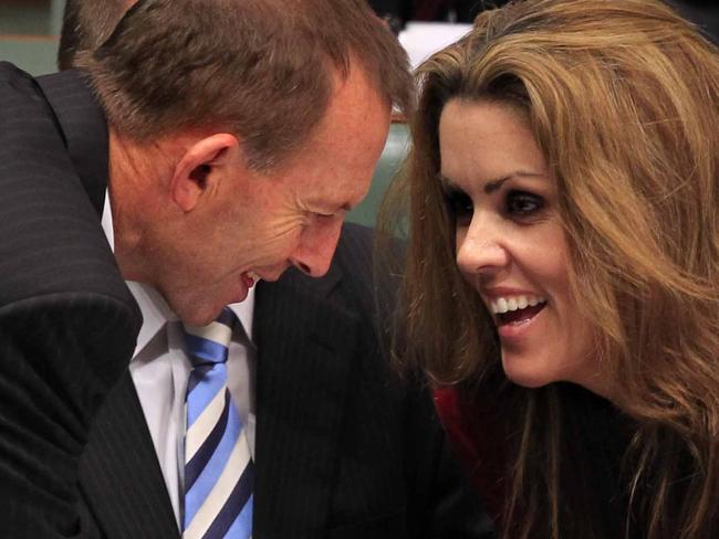 Opposition leader Tony Abbott talks with his Chief of Staff Peta Credlin during Question Time today in the House of Representatives, Federal Parliament.