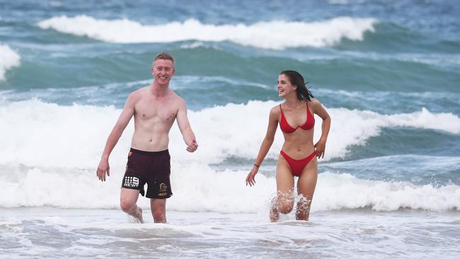 Felicity Parsons from Warwick State High and Nick Carrie from Iona at Surfers Paradise on The Gold Coast. Photograph: Jason O'Brien / Sunday Mail