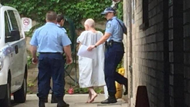 Walsh is escorted from Maroubra police station after being charged with Townsend’s murder. Picture: Seven News