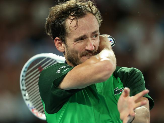 MELBOURNE, AUSTRALIA - JANUARY 28: Daniil Medvedev plays a forehand during their Men's Singles Final match against Jannik Sinner of Italy during the 2024 Australian Open at Melbourne Park on January 28, 2024 in Melbourne, Australia. (Photo by Daniel Pockett/Getty Images)