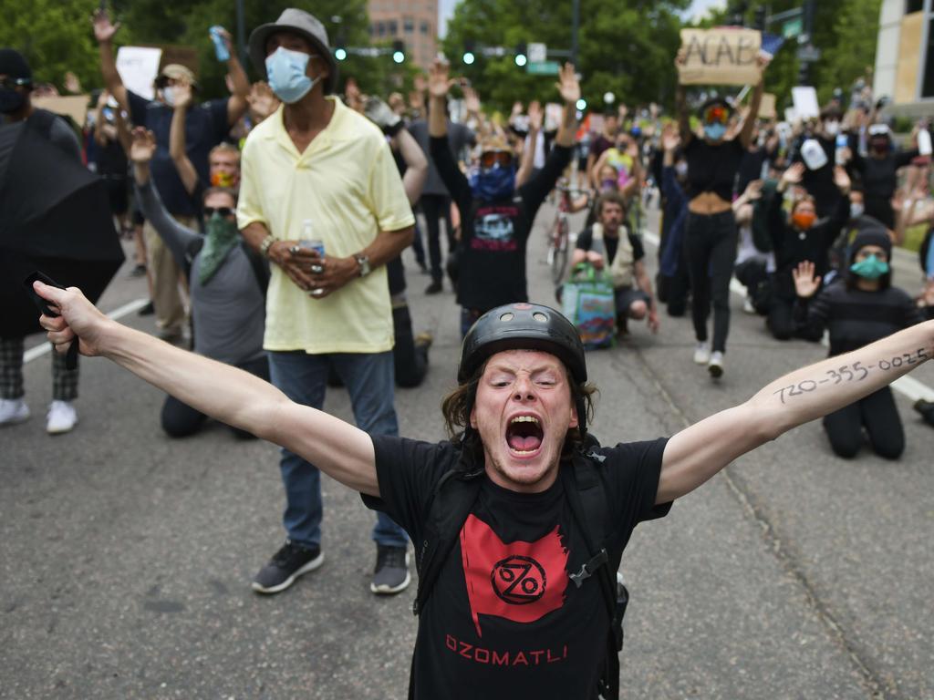 A man yells at police in Denver, Colorado. Picture: Michael Ciaglo/Getty Images/AFP