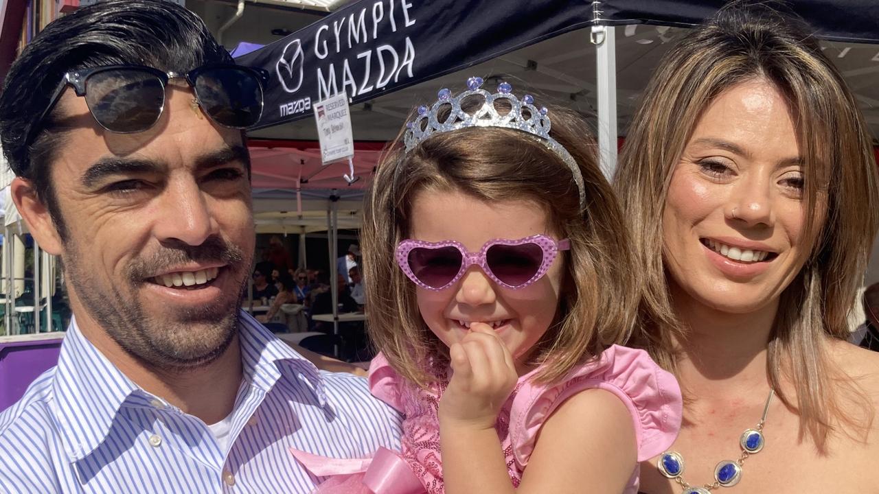 Nathan Fawkner, Edie Fawkner, and Chelsea Kennedy enjoy a day of fun at the Gympie Races on Saturday, July 15, 2023.