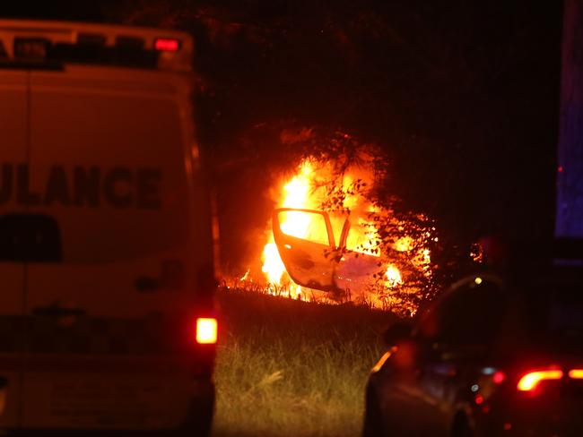 The vehicle was well alight by the time emergency services arrived. Picture: John Grainger