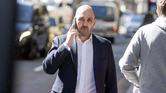 KPMG associate director Daniel Dunkley leaves Downing Centre Local Court in 2022. Picture: Liam Mendes