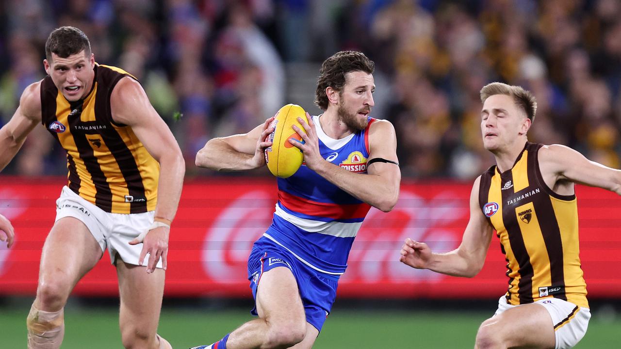 Mitchell says the Hawks were ‘mature’ when the Bulldogs started the final quarter with a goal via captain Marcus Bontempelli (centre) and threatened to come back. Picture: Mark Stewart