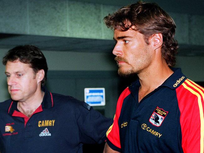 David Pittman arrives at Adelaide Airport after copping it from coach Malcolm Blight in 1997.