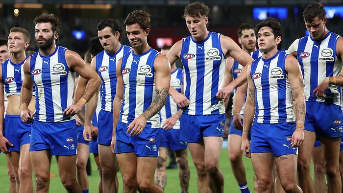 MELBOURNE, AUSTRALIA - APRIL 21: The Kangaroos look dejected after losing the round six AFL match between North Melbourne Kangaroos and Hawthorn Hawks at Marvel Stadium, on April 21, 2024, in Melbourne, Australia. (Photo by Quinn Rooney/Getty Images)