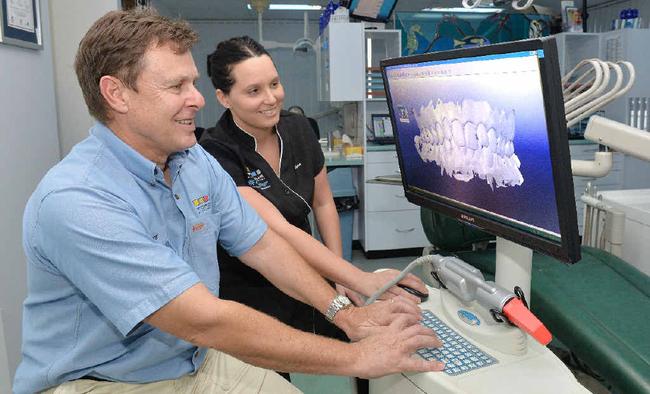 Torque Orthodontics Dr Peter Monckton and hygienist Alarna Pungar view 3D images on an Itero scanner. Picture: Tony Martin