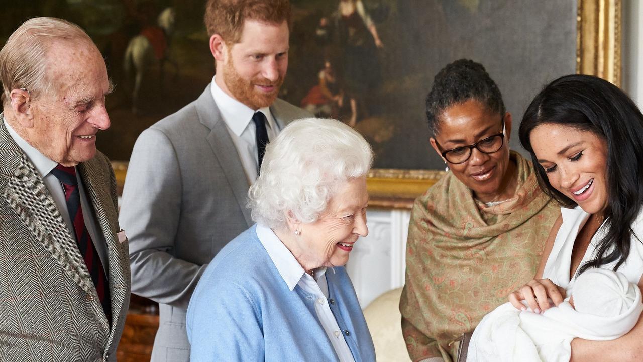 The Duke and Duchess of Sussex show their newborn son Archie to Queen Elizabeth II, the Duke of Edinburgh, and Meghan’s mother Doria Ragland. Picture: AFP Photo/Chris Allerton/copyright SussexRoyal