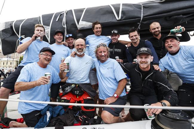 Alive skipper Duncan Hine with his crew as Alive claimed line honours in the 2020 Launceston to Hobart yacht race. Picture: Zak Simmonds