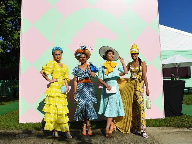 Fashions on the Field contestants pose for a photo. Picture: AAP Image/James Ross