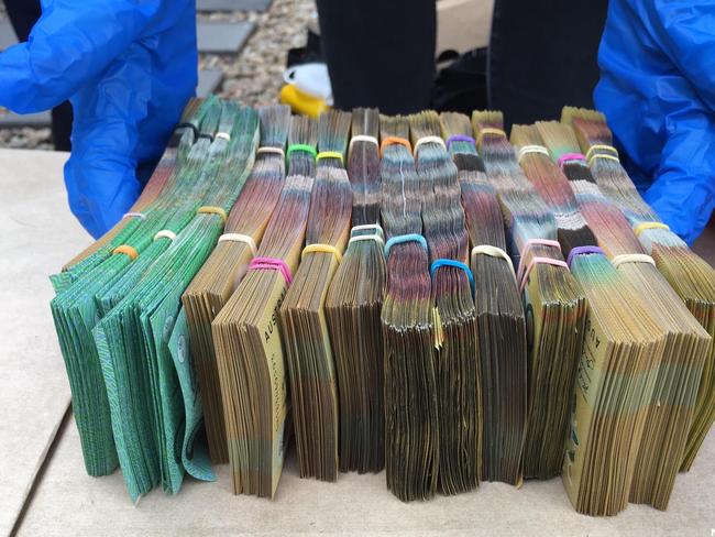 Some of the cash seized as part of the operation.