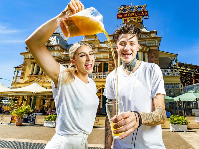 Olive Lincoln from Ashgrove and Haedyn Rawson from Indooroopilly enjoy a beer at Breakfast Creek Hotel. Picture: Richard Walker