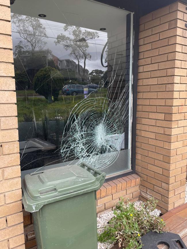 A smashed window at the restaurant.