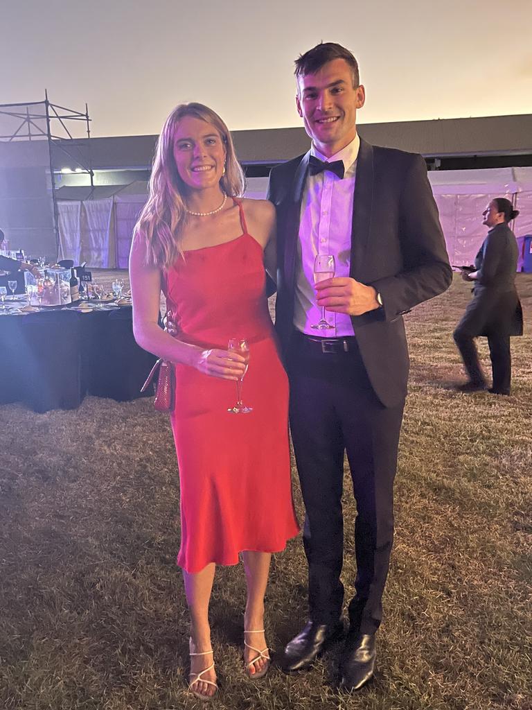 Alex Hinchcliff and Darwin Turf Club chief financial officer Lachlan Fairley enjoy the 2022 Darwin Cup Gala Ball. Picture: NT News