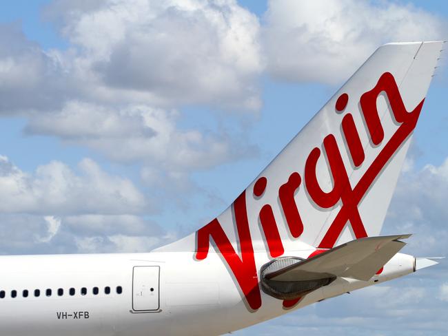 The new Virgin Australia logo on the tail of one of the Airbus A330 aircraft during announcement of rebranding from Virgin Blue at Sydney Airport in Sydney.