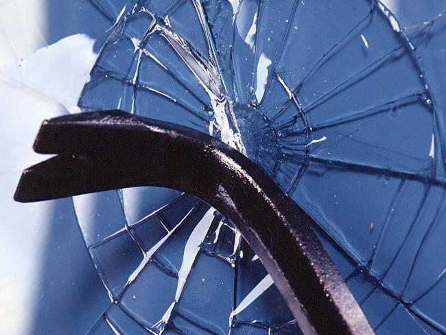 Undated : Glass being smashed with crowbar.