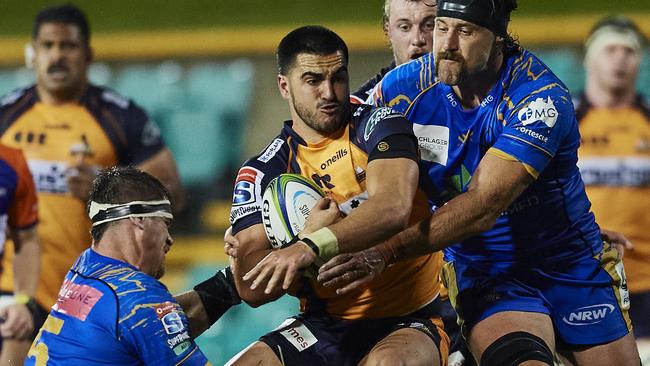 SYDNEY, AUSTRALIA - JULY 25: Tom Wright of the Brumbies is tackled during the round 4 Super Rugby AU match between the Western Force and the Brumbies at Leichhardt Oval on July 25, 2020 in Sydney, Australia. (Photo by Brett Hemmings/Getty Images)