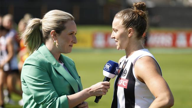 Lauren Wood interviews Collingwood’s Ruby Schleicher after an AFLW game. (Photo by Darrian Traynor/Getty Images)