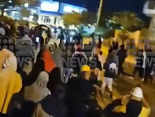 A large crowd pictured at Christine Ave in Robina on Saturday May 6 as police conducted an operation targeting hoons in the area. Picture: Nine Gold Coast News.