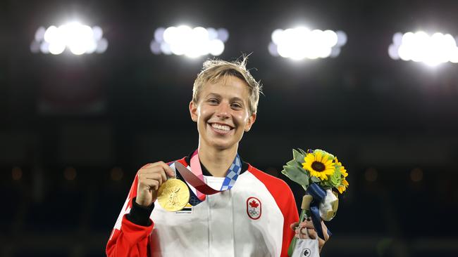 YOKOHAMA, JAPAN - AUGUST 06: Gold medalist Quinn #5 of Team Canada poses with her gold medal during the Women's Football Competition Medal Ceremony on day fourteen of the Tokyo 2020 Olympic Games at International Stadium Yokohama on August 06, 2021 in Yokohama, Kanagawa, Japan. (Photo by Naomi Baker/Getty Images)