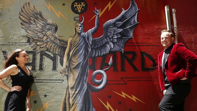 Cosima De Vito and Greg Gould in front of the mural outside The Vanguard at Newtown before it was defaced. Gould is performing an exclusive Mardi Gras event with Cosima De Vito and Prinnie Stevens at The Vanguard on March 1. Picture: John Appleyard