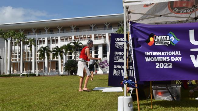 Women and allies gathered outside the NT parliament as part of the City of Darwin International Women's Day walk and Celebrations, Saturday March 5.