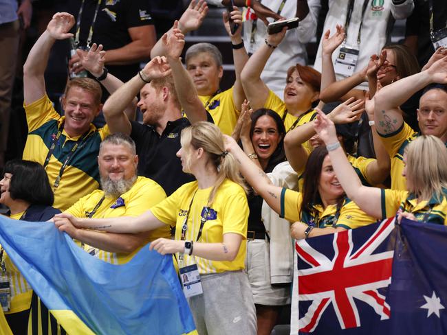 The couple happily mingled with members of the Australian and Ukrainian teams. Picture: AFP