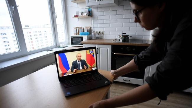 Russian President Vladimir Putin’s live address to the nation is beamed into citizens’ homes. Picture: AFP