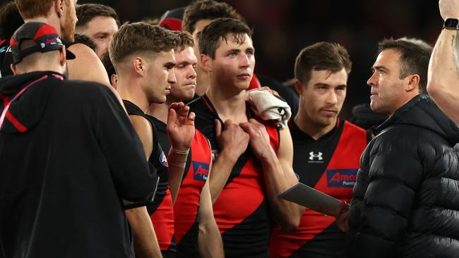 MELBOURNE, AUSTRALIA - AUGUST 05: Bombers coach, Brad Scott speaks to the players at the break during the round 21 AFL match between Essendon Bombers and West Coast Eagles at Marvel Stadium, on August 05, 2023, in Melbourne, Australia. (Photo by Robert Cianflone/Getty Images)