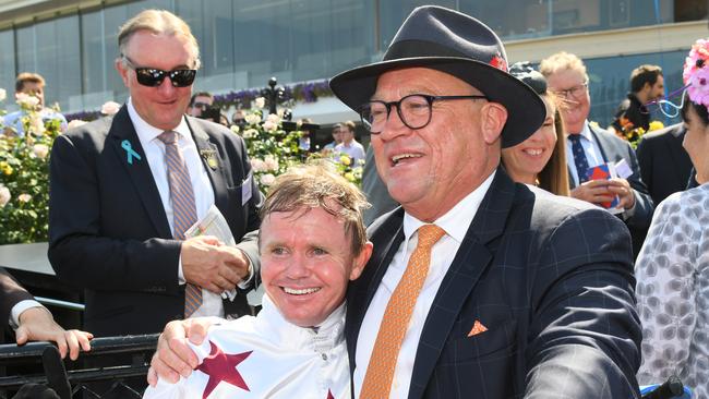 Barend Vorster and trainer Tony McEvoy celebrate after Sunlight won the Group 1 Newmarket Handicap at Flemington in March. Picture: Vince Caligiuri/Getty Images