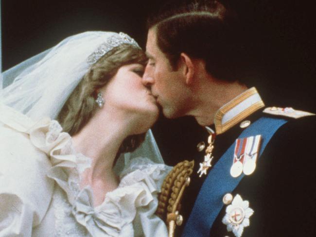 Britain's Prince Charles kisses his bride, the former Diana Spencer, in this July 29, 1981 file photo, on the balcony of Buckingham Palace in London after their wedding. (AP Photo)