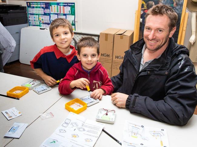 Chinchilla scouts have helped light the way for children living in poverty overseas, teaming up with Origin Energy to build solar powered lights. Photo/Origin Energy