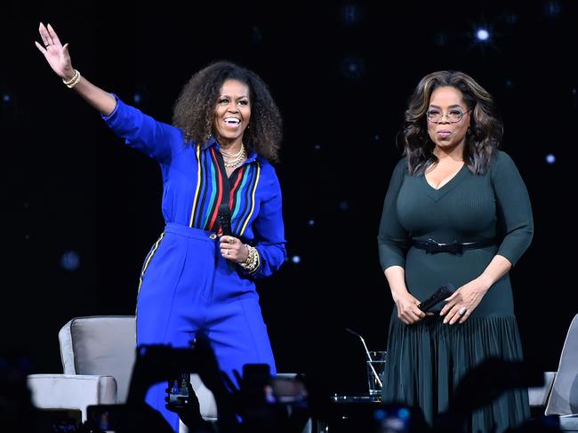 Michelle Obama and Oprah Winfrey during Oprah's 2020 Vision: Your Life in Focus Tour. Picture: Theo Wargo/Getty Images