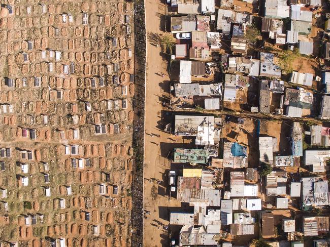 Unequal Scenes: Segregation of urban spaces in South Africa. Picture: Johnny Miller/Millefoto/Rex Shutterstock/Australscope