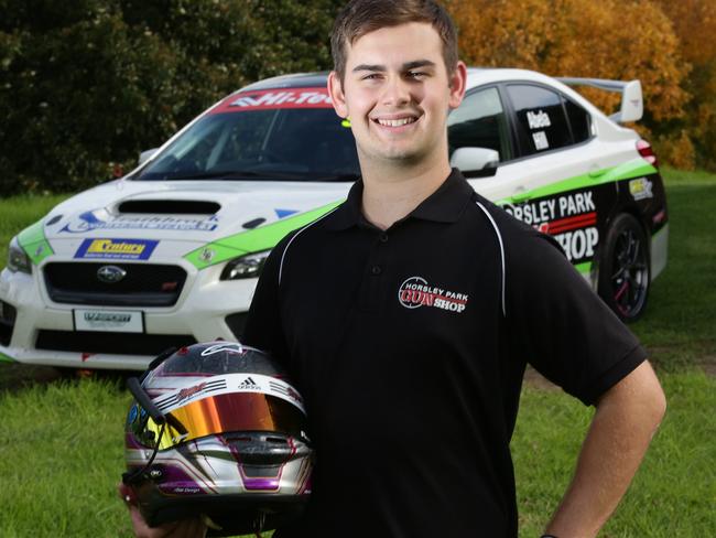 James Abela is the a climbing star of the motor racing scene in Australia. Pictured with his Subaru that he just won at Bathurst. James has raced go karts since age eight.