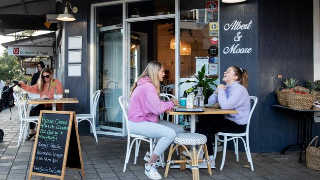 Friends enjoy a breakfast catch-up at Albert and Moore Cafe in Freshwater. Picture: Cameron Spencer/Getty Images