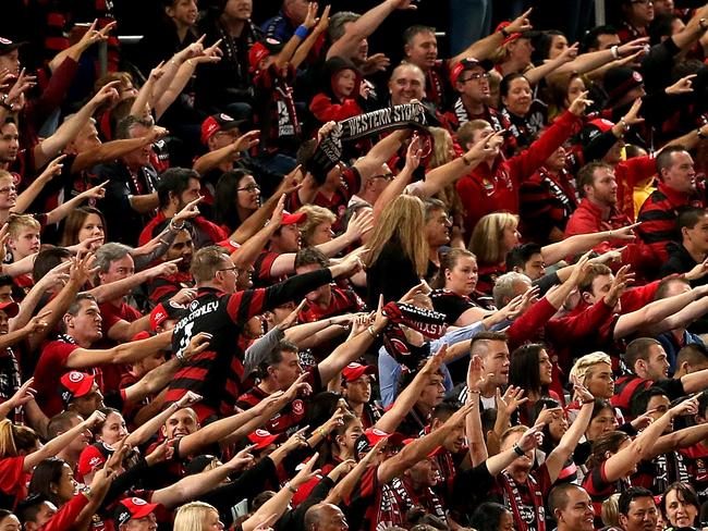 SYDNEY, AUSTRALIA - APRIL 26: Western Sydney Wanderers fans cheer during the A-League Semi Final match between the Western Sydney Wanderers and the Central Coast Mariners at Pirtek Stadium on April 26, 2014 in Sydney, Australia. (Photo by Ashley Feder/Getty Images)