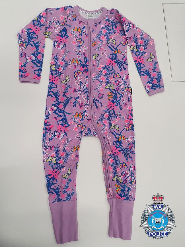 A pink flower and butterfly-patterned pyjama suit similar to that worn by Cleo Smith before she went missing from a WA Campground.