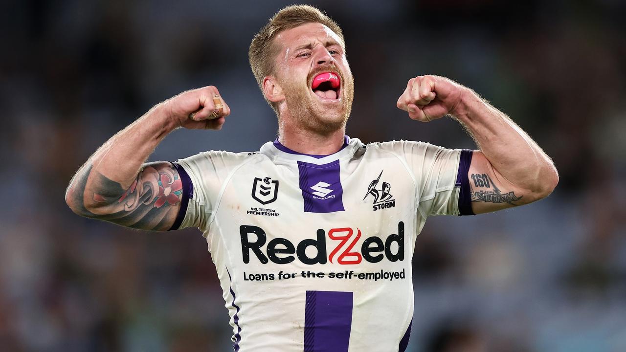 Cameron Munster of the Storm celebrates the win over the Rabbitohs. Photo by Cameron Spencer/Getty Images)