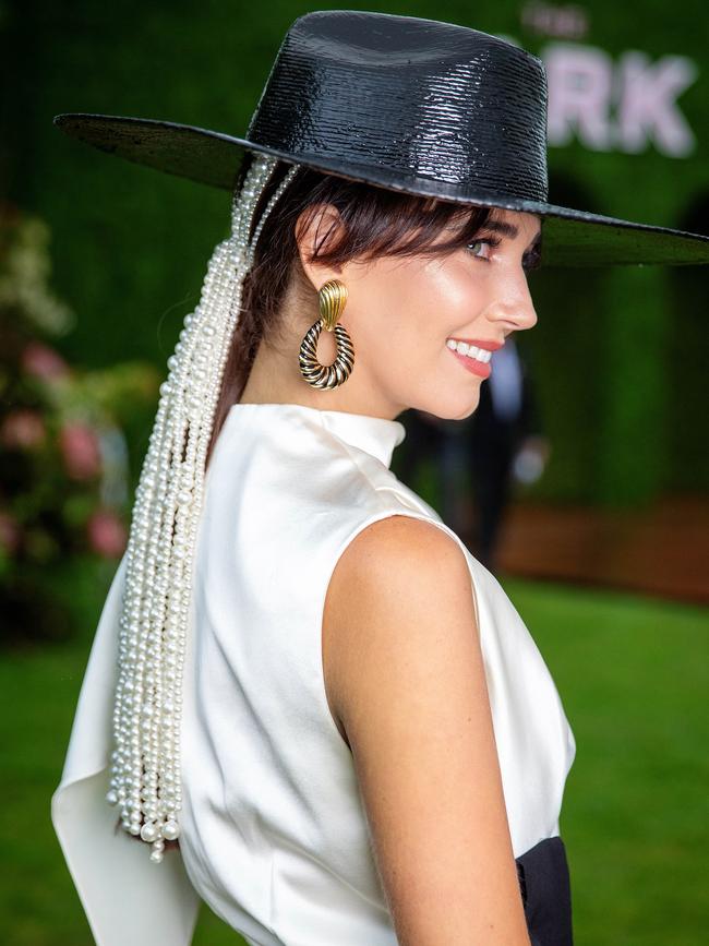 Fashions on the Field contestant Carena West opted for some intricate millinery. Picture: Mark Stewart