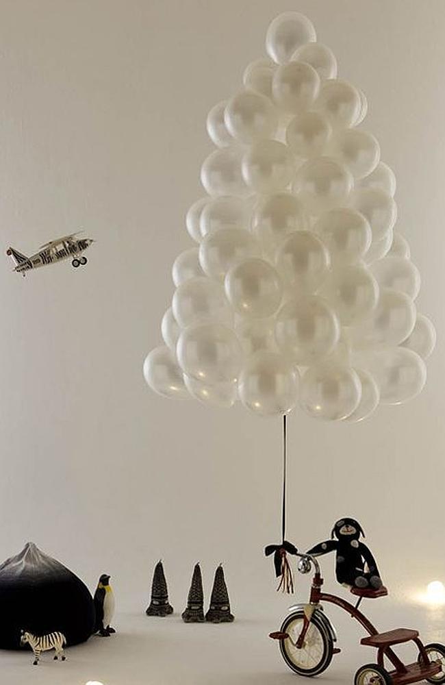 The cloud of balloons tree:not sure why there's a plane and a zebra though? Picture: Pinterest/Onemillionpicture.com