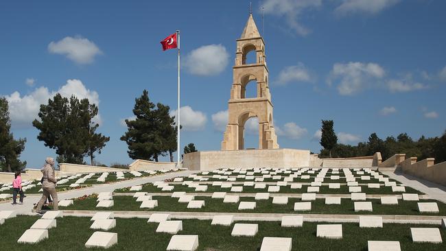 Visitors walk among headstones of Turkish soldiers killed during the Gallipoli campaign. Picture: Getty Images.