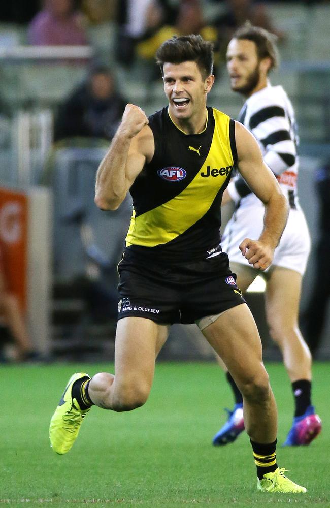 Trent Cotchin celebrates a goal in the second quarter. Picture: George Salpigtidis