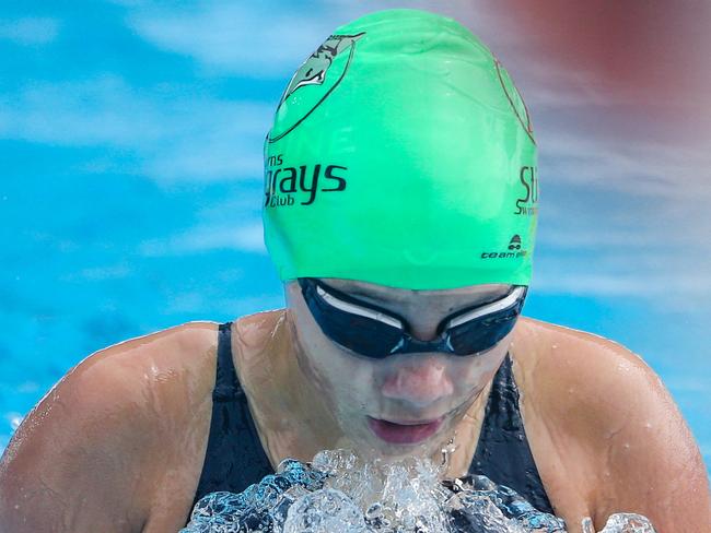 Cairns Stingrays’ Jamie Percy wins her heat in the 100m breaststroke. Picture: Glenn Campbell