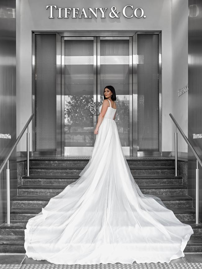 Lauren Tedesco wore a Vacarelli Couture gown with an incredible train for the couple’s ceremony at St Patrick’s Church, followed by a reception at The Grand Ballroom. Photographer: Ky Luu/B Captured