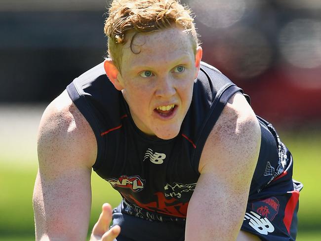 MELBOURNE, AUSTRALIA - DECEMBER 02: Clayton Oliver of the Demons marks during the Melbourne Demons AFL pre-season training session at Gosch's Paddock on December 2, 2016 in Melbourne, Australia. (Photo by Quinn Rooney/Getty Images)